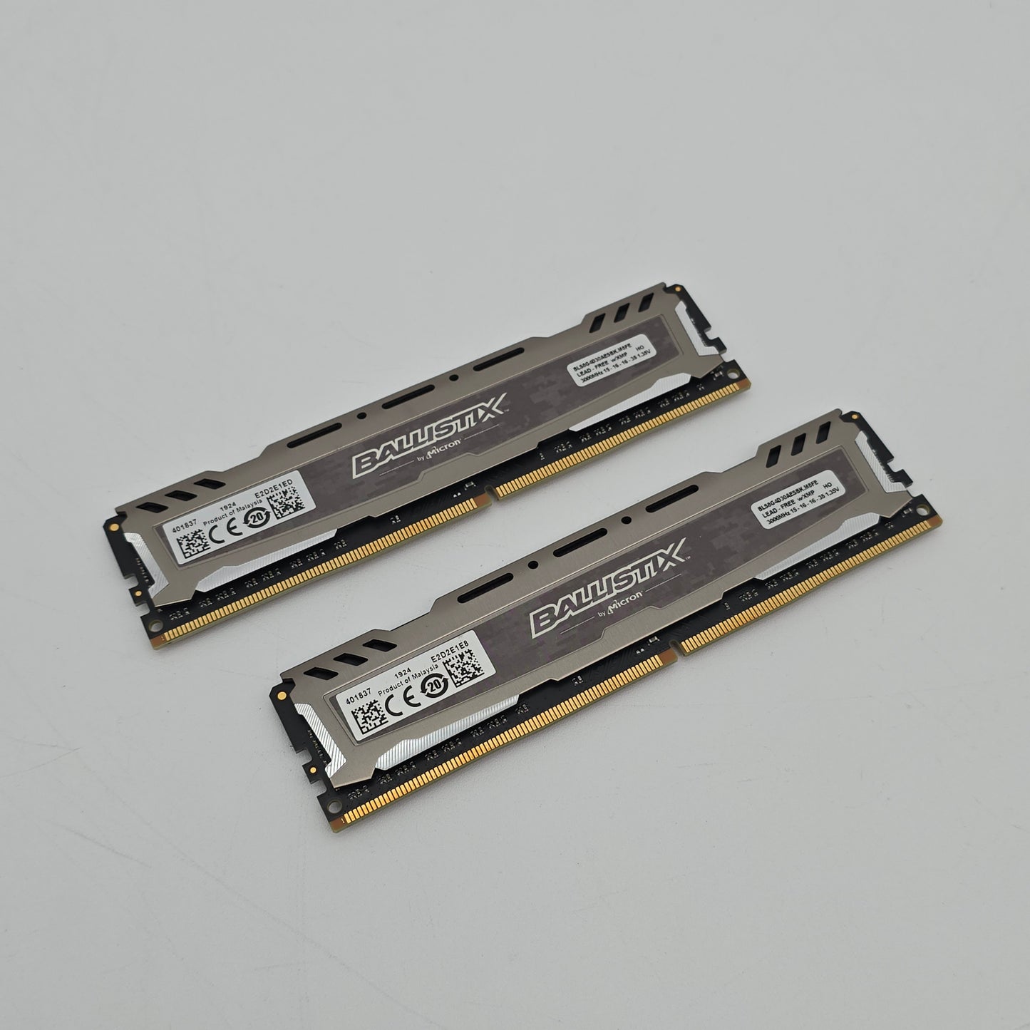 Two RAM modules on a gray background