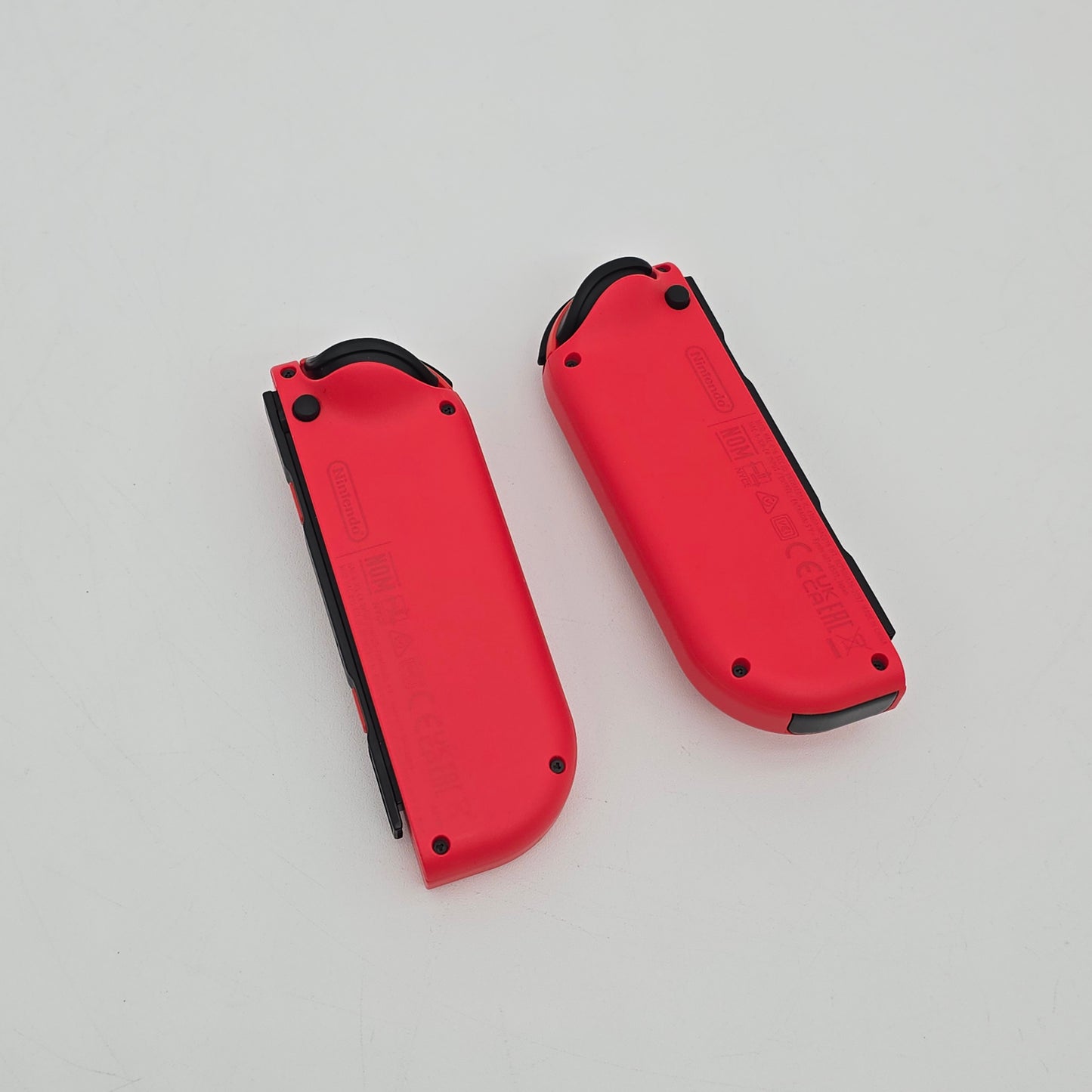 Nintendo Switch OEM Mario Red Joycon pair