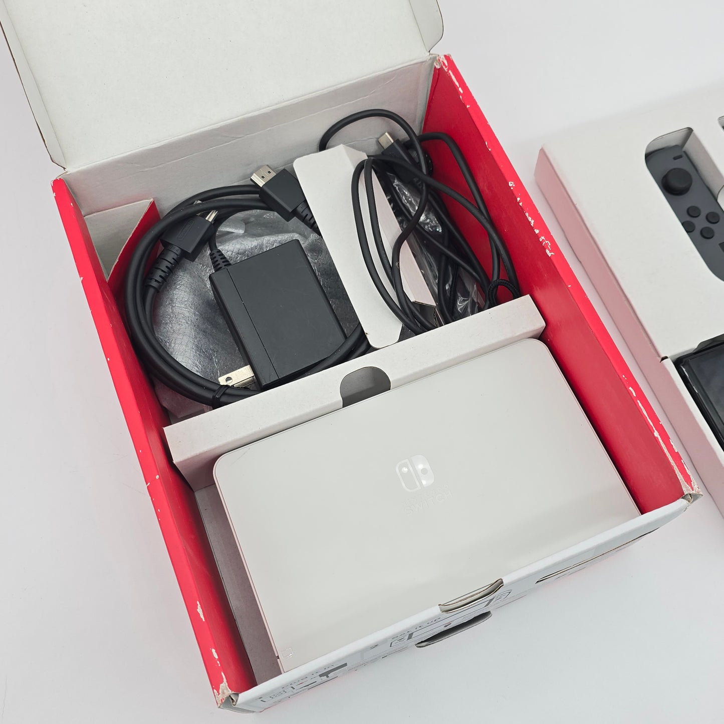 Nintendo Switch OLED White Edition w/ Gray Joycons