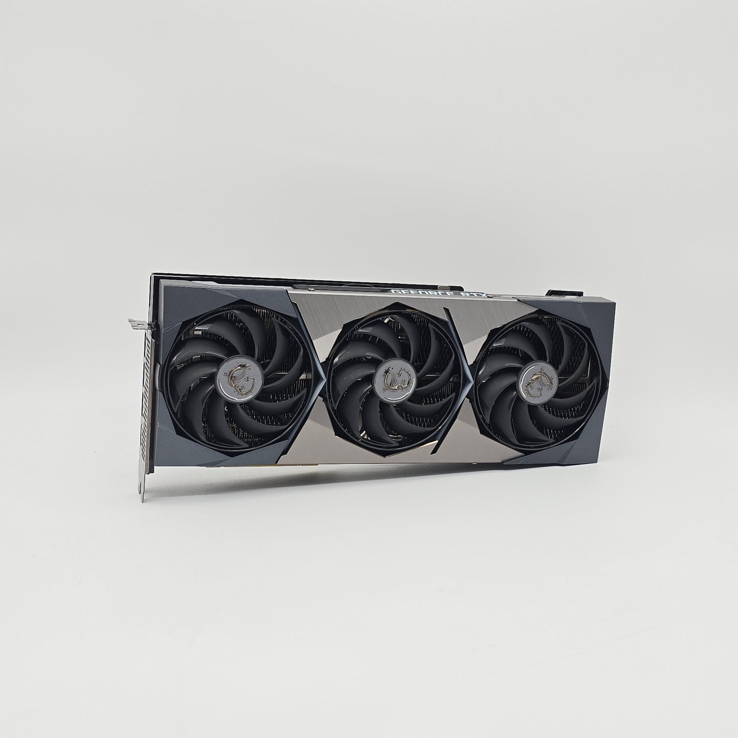 Graphics card with three fans on a white background