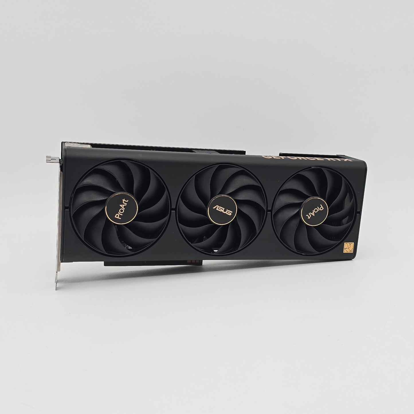 Computer graphics card with three fans on a gray background