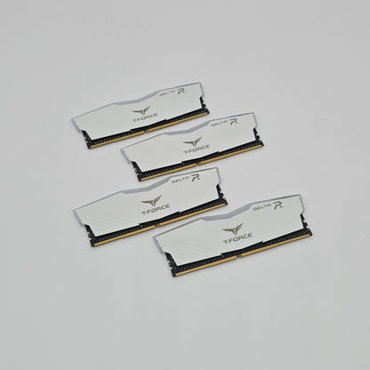 Four T-Force memory sticks on a light gray background