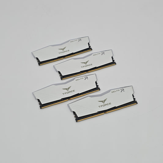 Four T-Force memory sticks on a light gray background