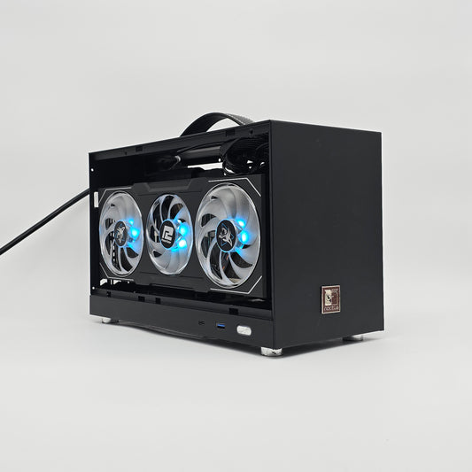 Black computer case with three fans on a white background