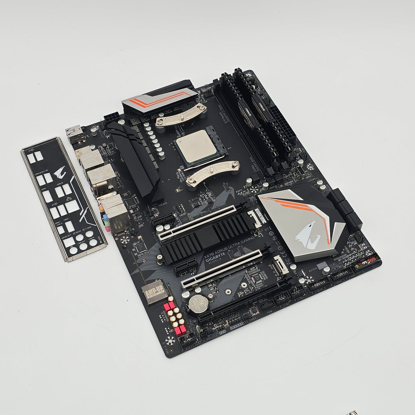 Computer motherboard on a light gray background