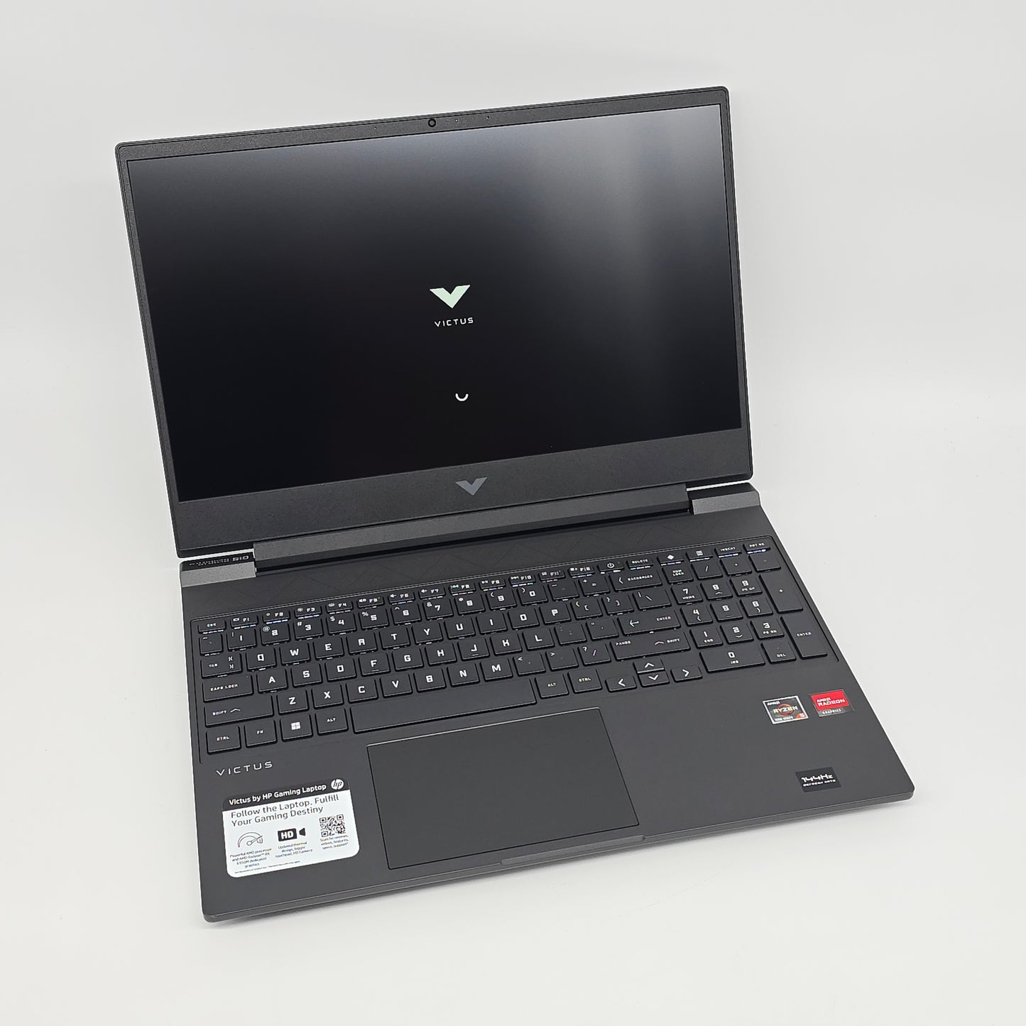 Black laptop with visible brand logo on a white background