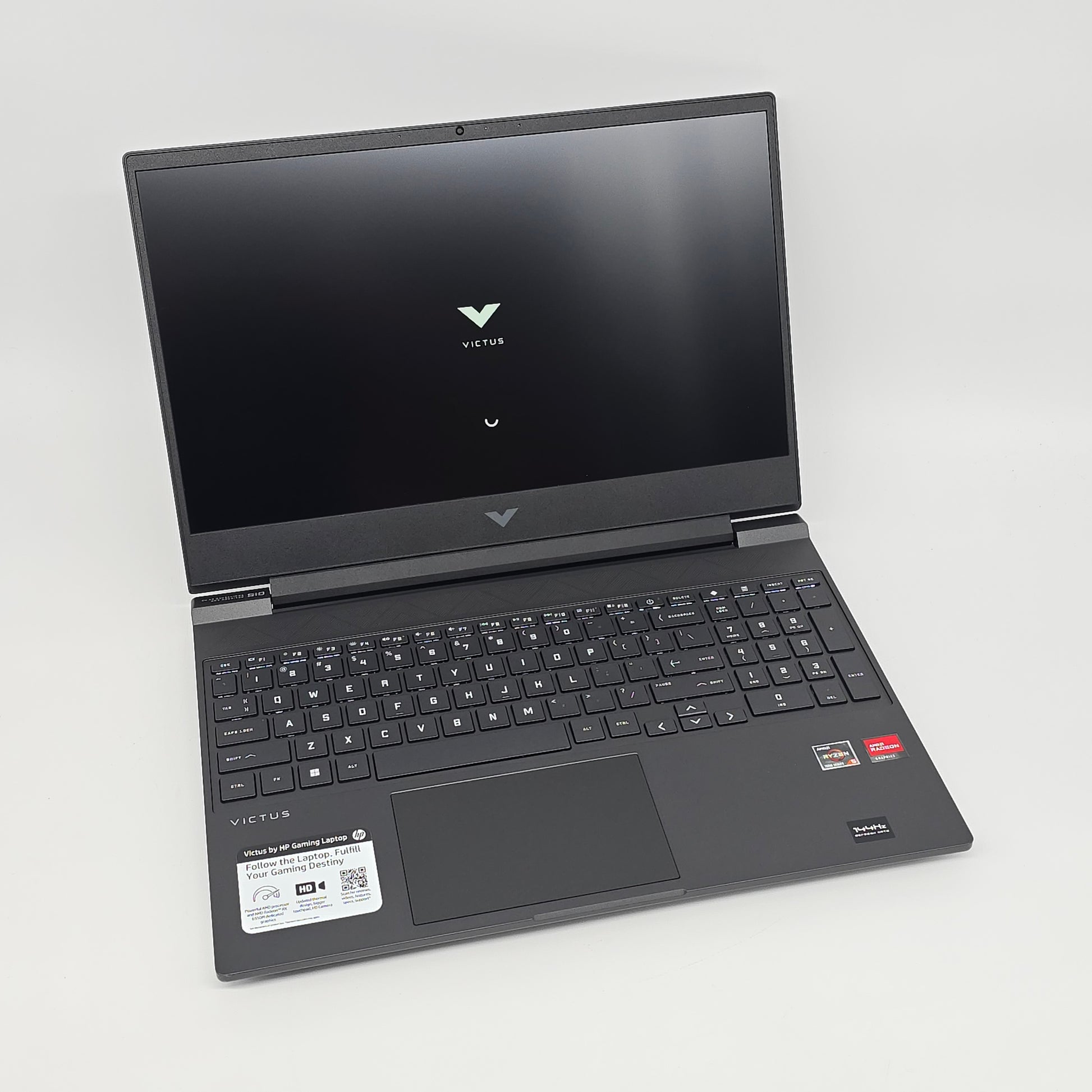 Black laptop with visible brand logo on a white background