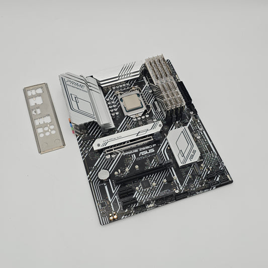 Computer motherboard with CPU socket on a gray background