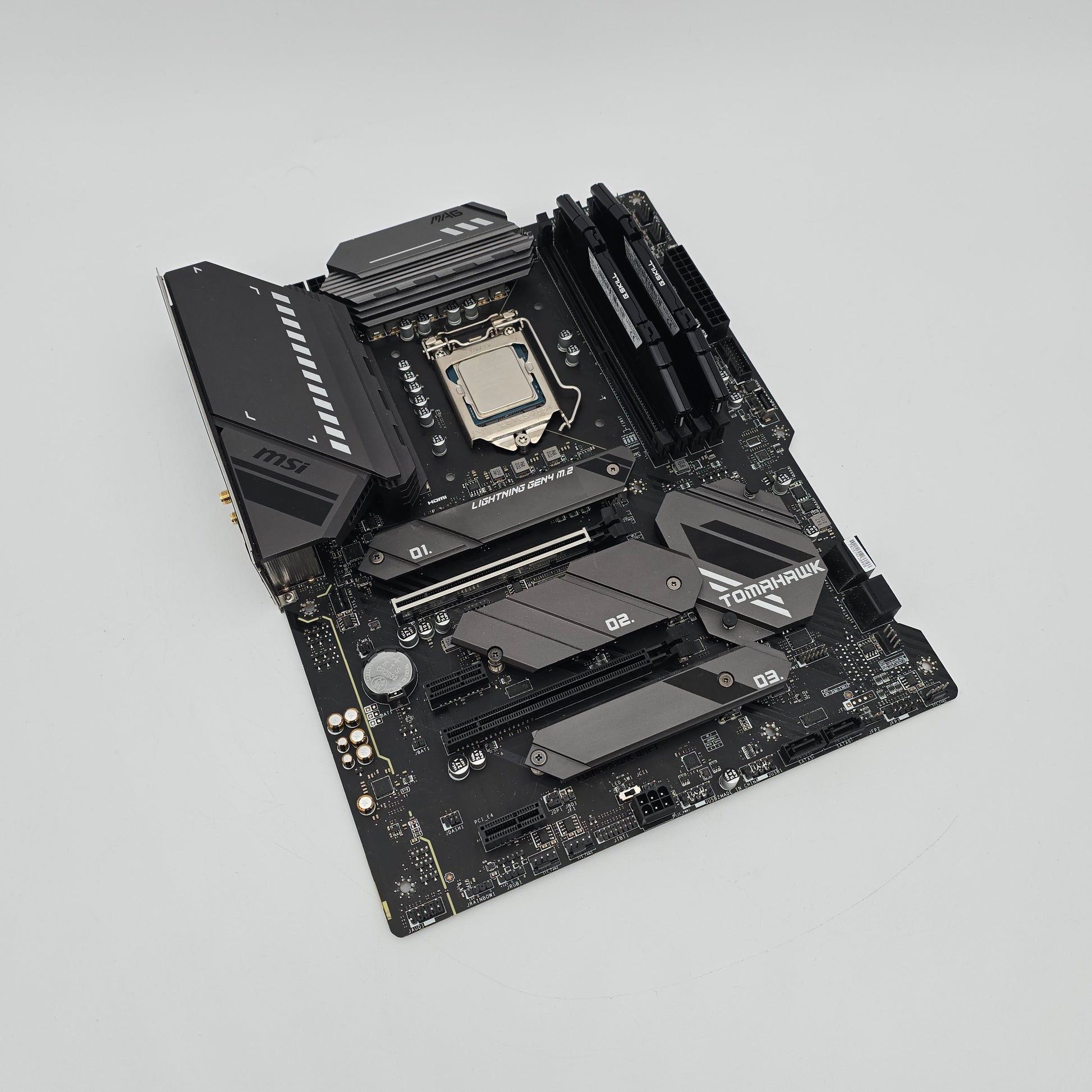 Computer motherboard on a light gray background