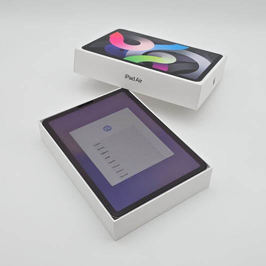 iPad Air with its packaging on a light gray background