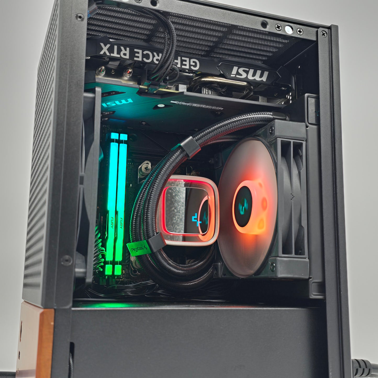 RTX 4060 Ti, Ryzen 7600X, 16GB DDR5, Custom Mini-ITX Liquid Cooled Gaming PC