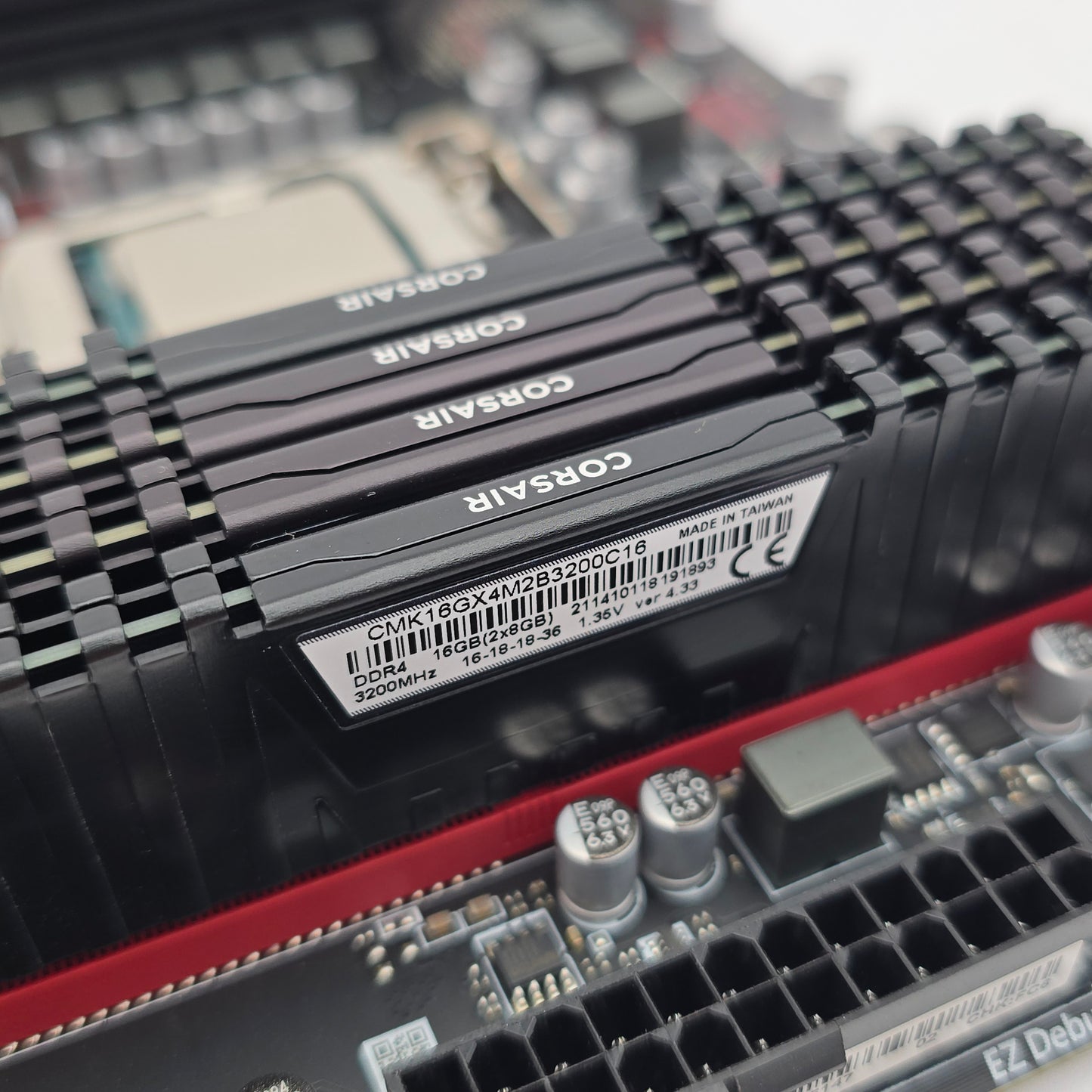 Close-up of Corsair RAM sticks on a motherboard with blurred background