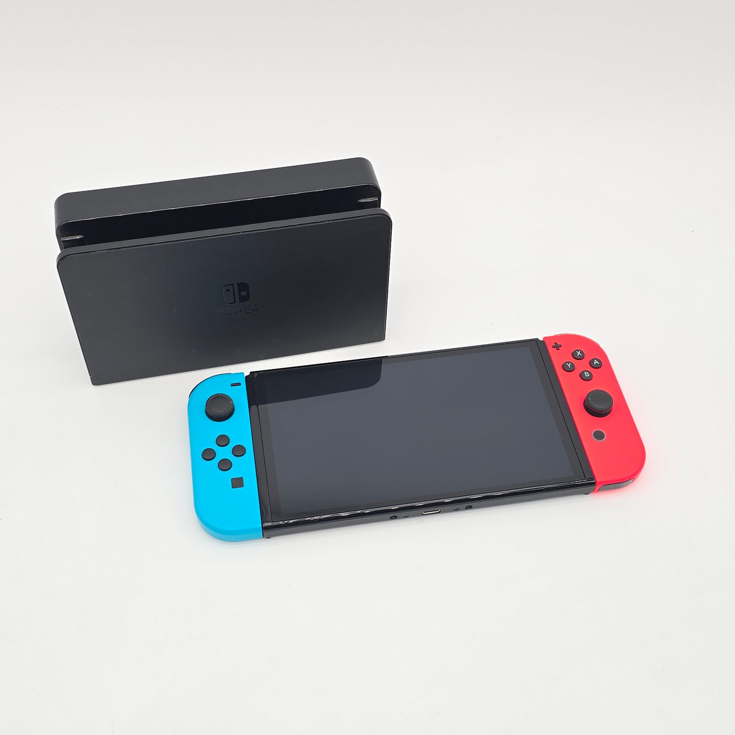 Nintendo Switch OLED, Blue/Red Joycons, Handheld Gaming Console with Dock and Cables