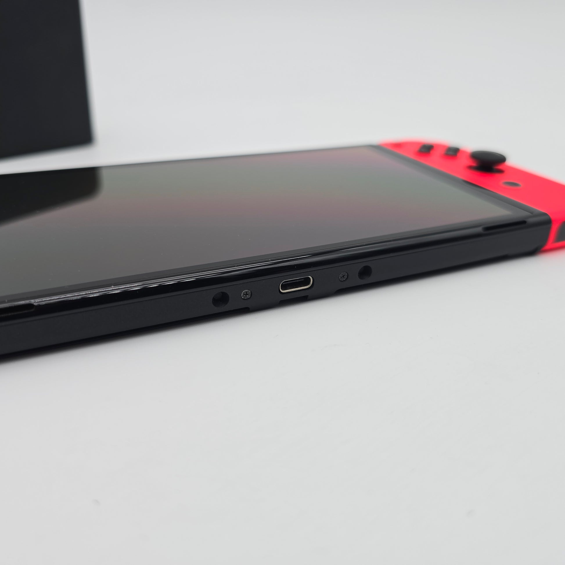 Nintendo Switch OLED, Blue/Red Joycons, Handheld Gaming Console with Dock and Cables