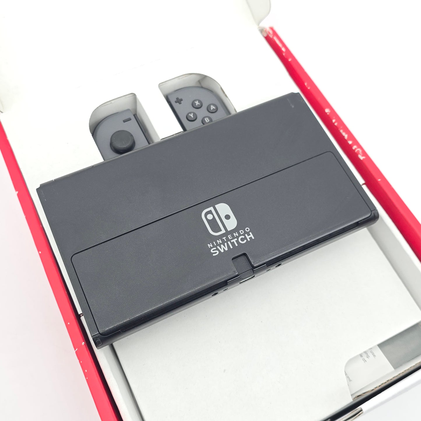 Nintendo Switch OLED White Edition w/ Gray Joycons