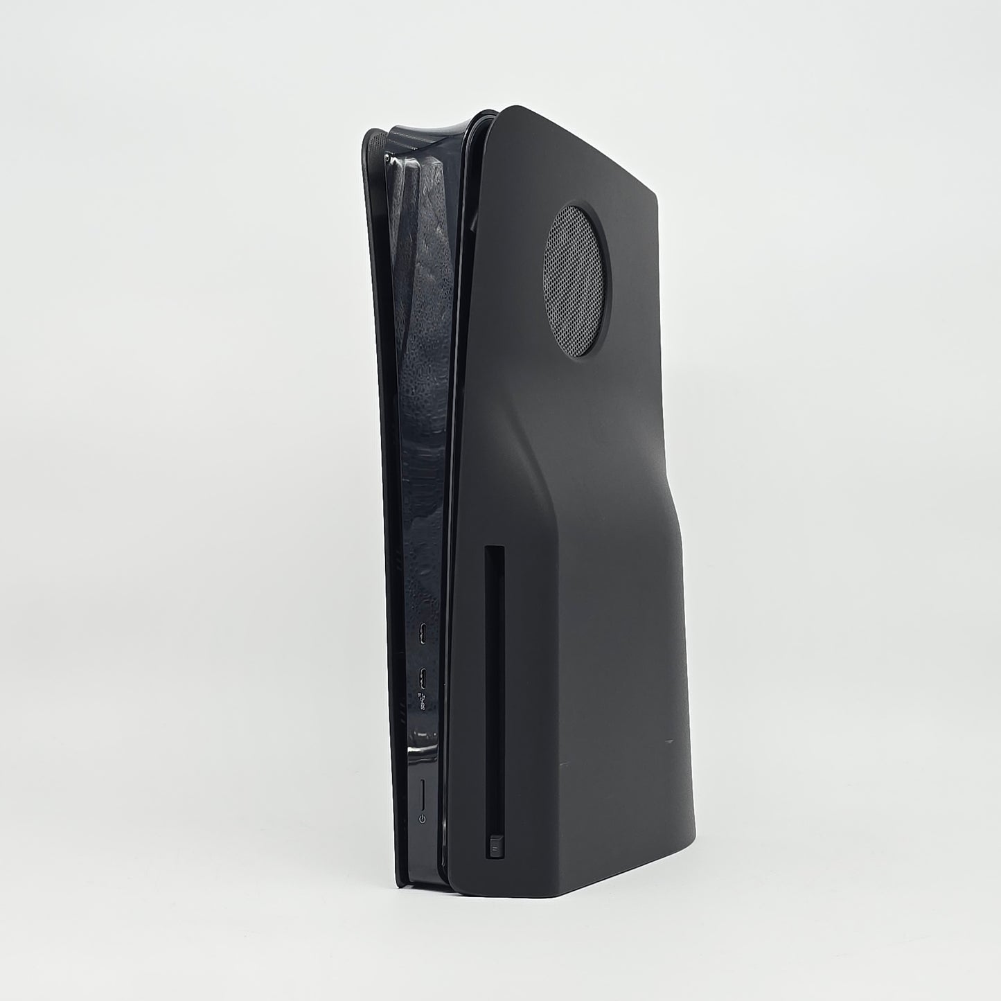 Playstation 5 slim edition with disk module attached and black faceplates