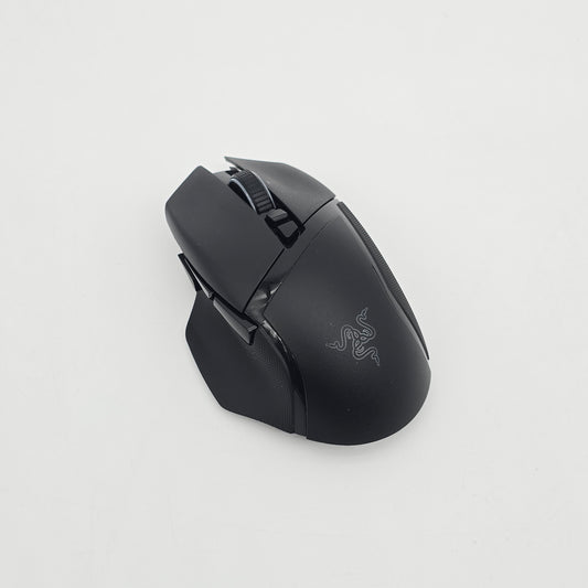 Black gaming mouse on a light gray background