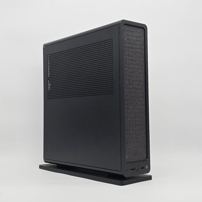 Black computer case on a white background, case is a fractal design ridge with an rtx 4080 super by nvidia inside