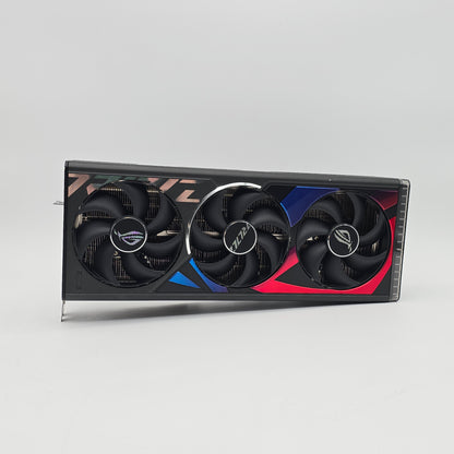 Gaming graphics card with three fans on a gray background