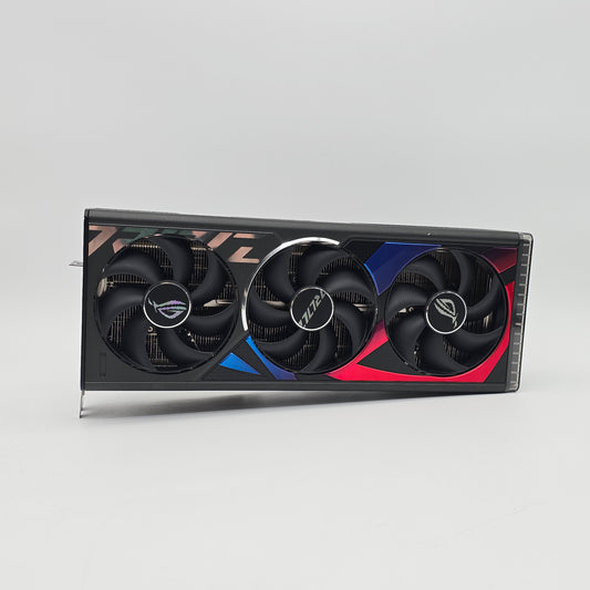 Gaming graphics card with three fans on a gray background