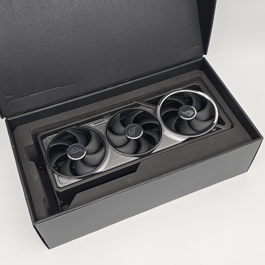 Three cooling fans in a black box on a white background