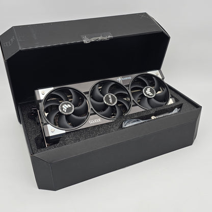 Three cooling fans in a black box on a light gray background