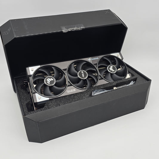 Three cooling fans in a black box on a light gray background