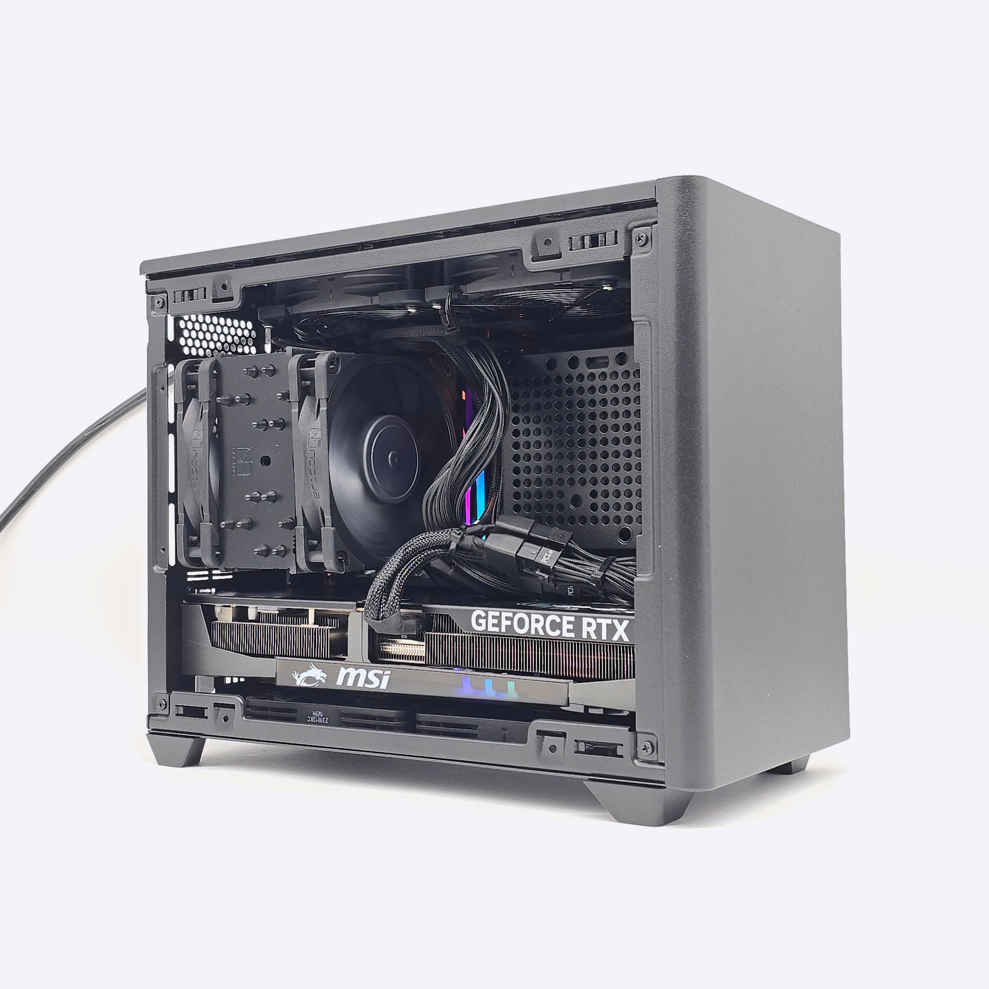 Open computer case with visible GeForce RTX graphics card on a white background
