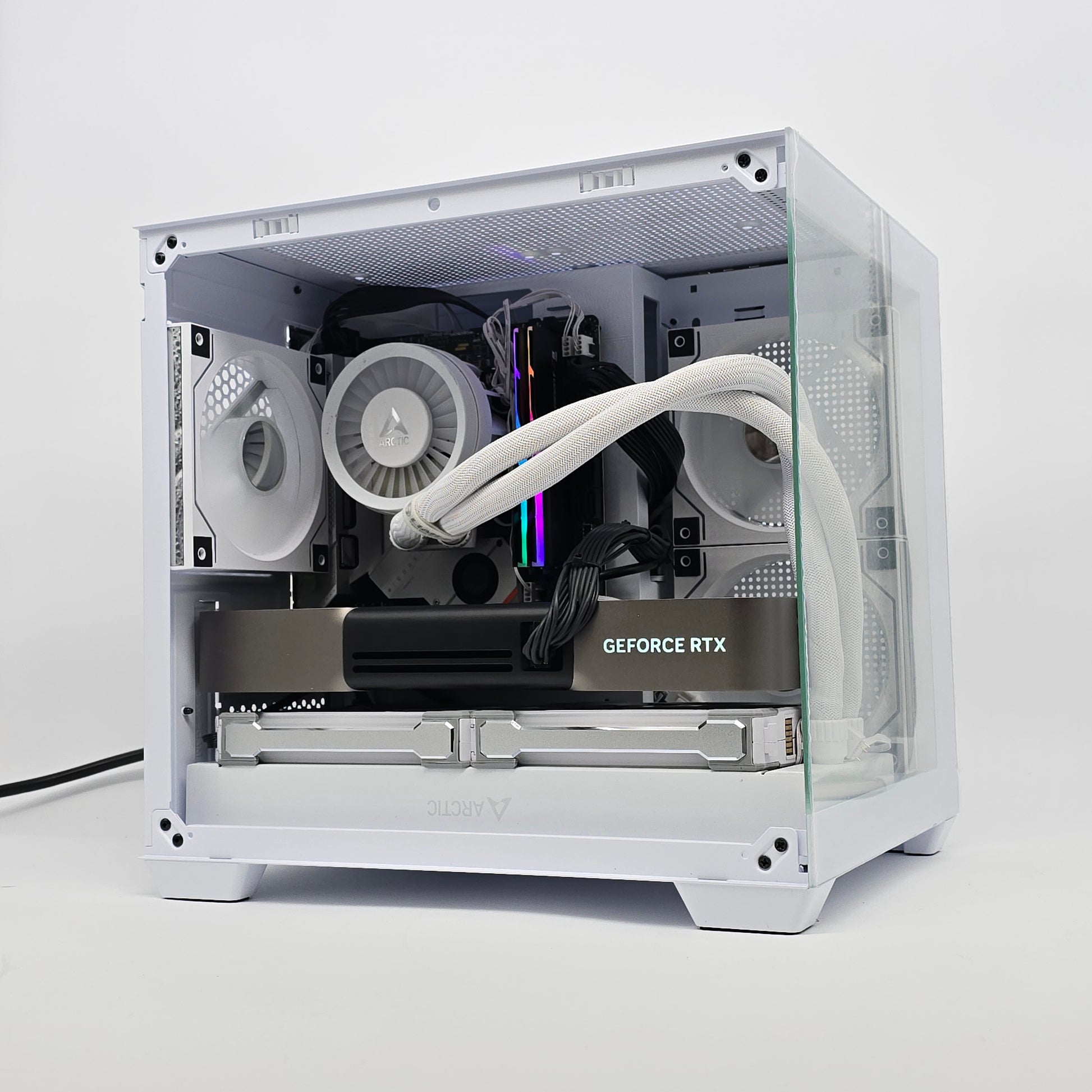 Computer case with visible internal components including a GeForce RTX graphics card on a white background