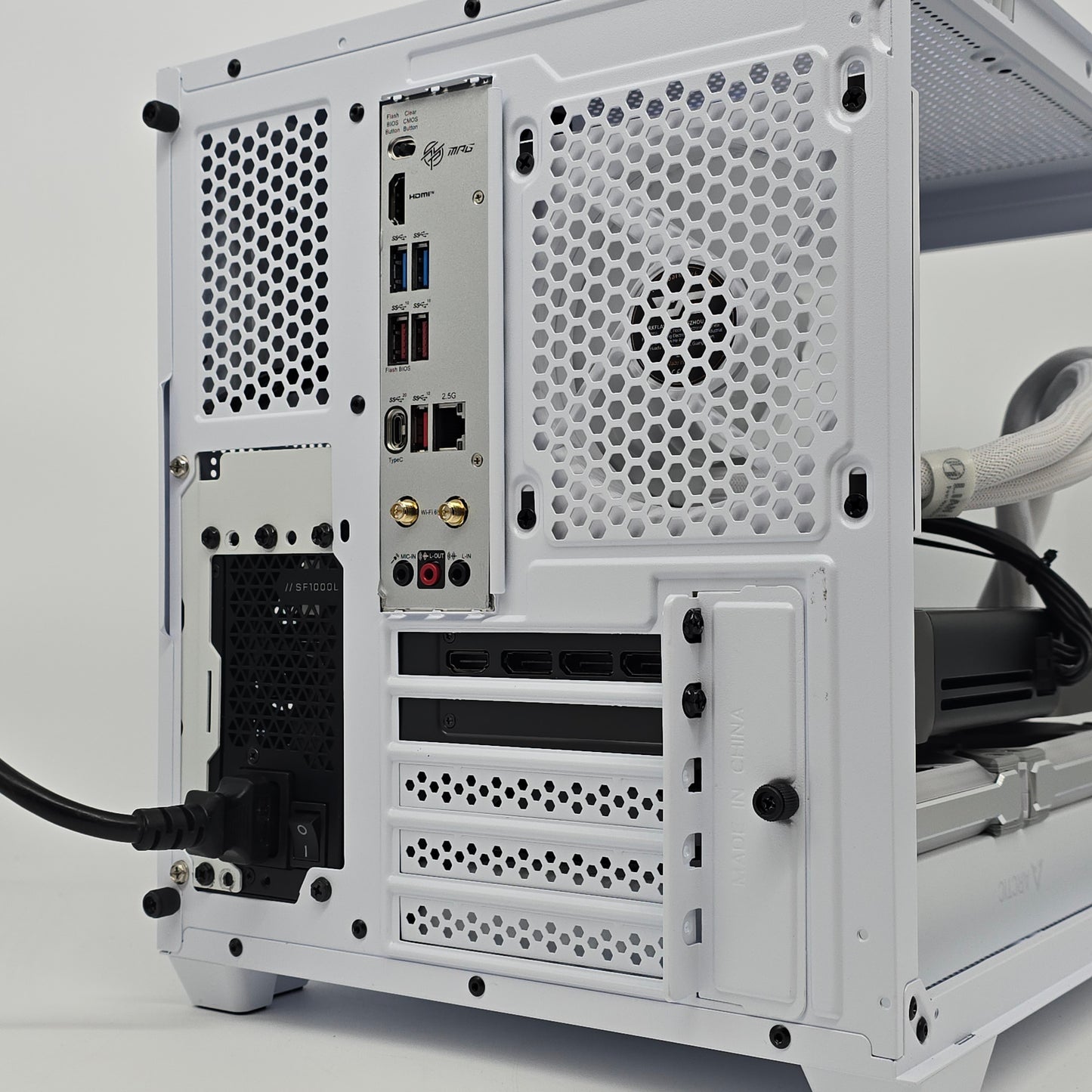 White computer case with visible components on a white background