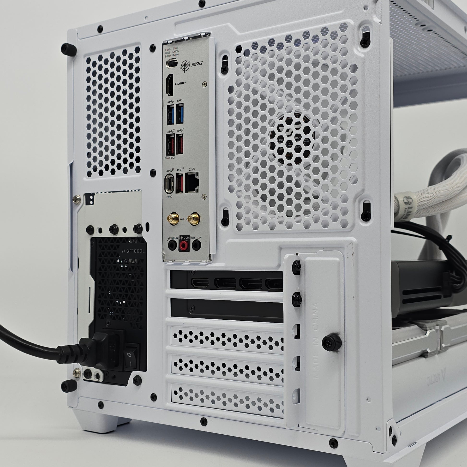 White computer case with visible components on a white background