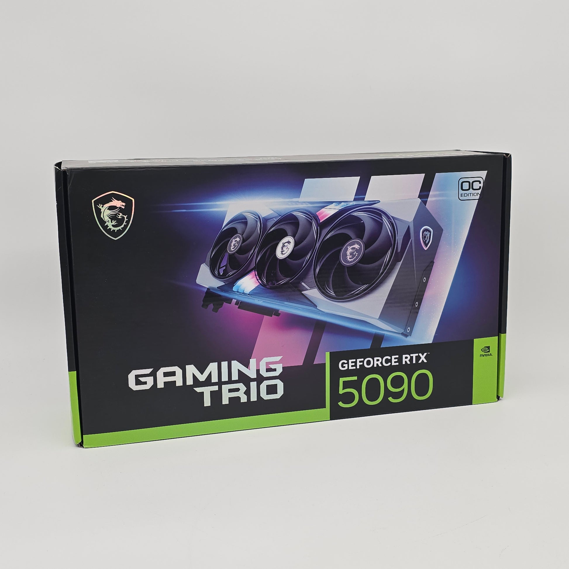 NVIDIA GeForce RTX 5090 GAMING TRIO graphics card packaging on a white background